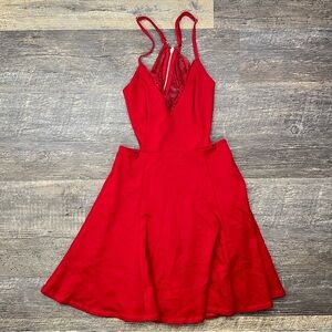 Lush red fit and flare dress with lace and cut outs size XS B172